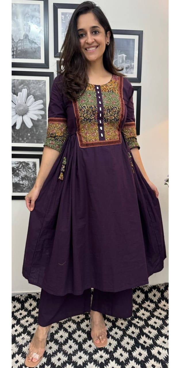 Celebrate in Style – Designer Flair Kurti Set with Tassels & Mirror Work
