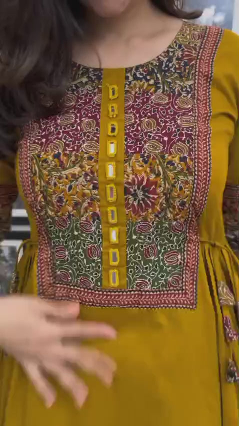 Celebrate in Style – Designer Flair Kurti Set with Tassels & Mirror Work